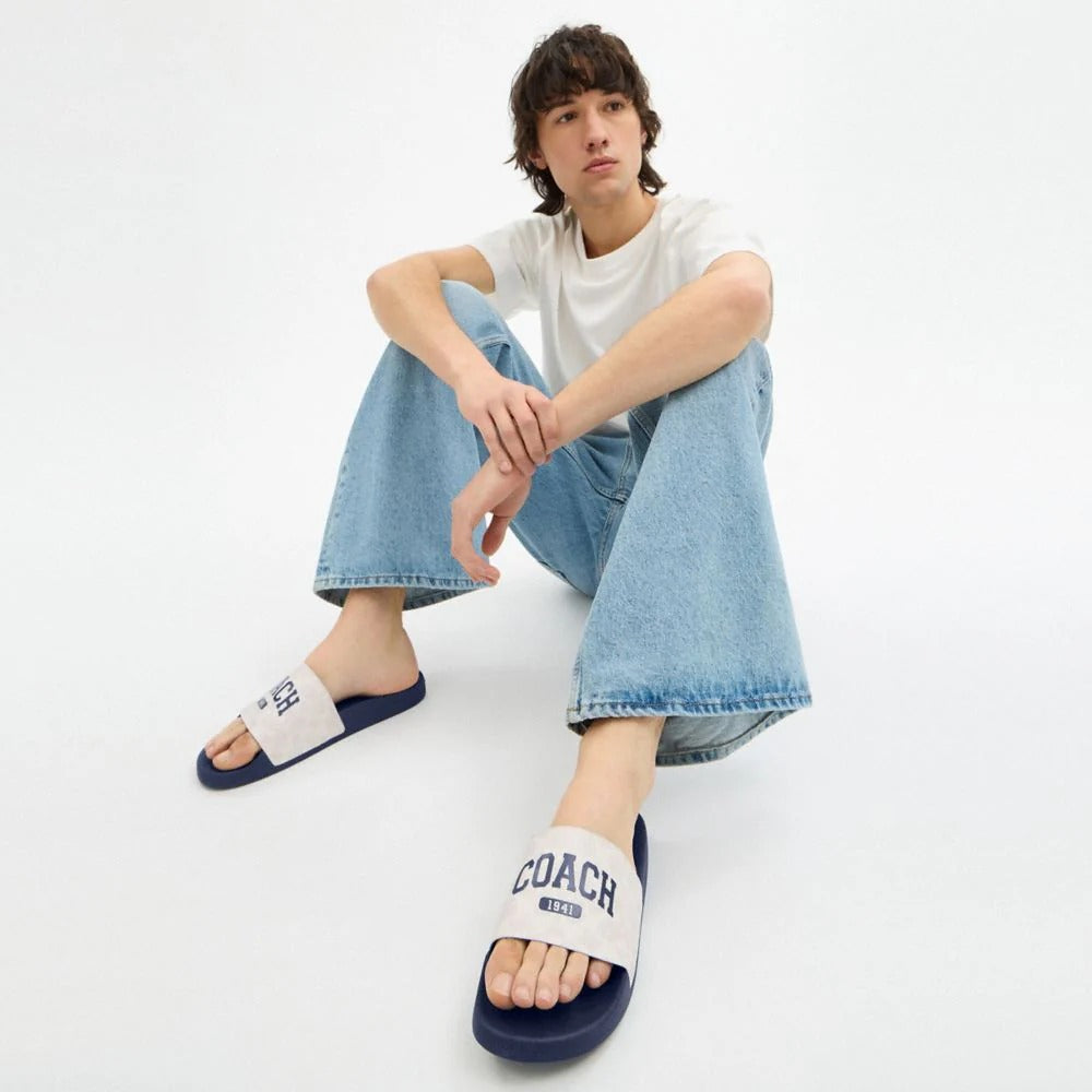 Coach Slide Sandal In Signature Canvas With Varsity Logo Deep Blue Chalk